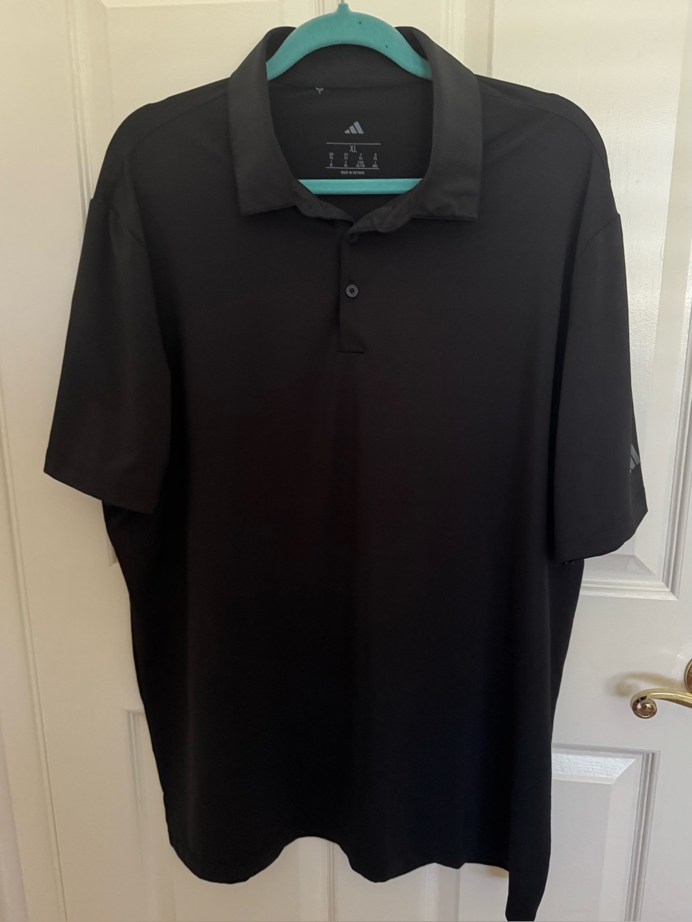 Adidas men's polo size XL.  Black.  Excellent condition.